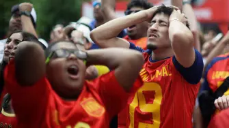 Fanáticos de España durante el primer partido del Grupo H. Foto: Reuters