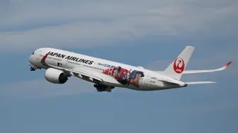 A Japan Airlines Airbus A350-900, painted with the face of Japanese baseball star Shohei Ohtani, takes off from Haneda airport in Tokyo on October 29, 2025. (Photo by GREG BAKER / AFP)