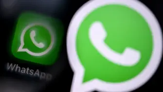 This illustration photograph taken on December 1, 2025, shows the logo of US instant messaging software Whatsapp displayed on a smartphone's screen, in Frankfurt am Main, western Germany. (Photo by Kirill KUDRYAVTSEV / AFP)