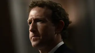 (FILES) Mark Zuckerberg, CEO of Meta, looks on during the US Senate Judiciary Committee hearing "Big Tech and the Online Child Sexual Exploitation Crisis" in Washington, DC, on January 31, 2024. Meta chief executive Mark Zuckerberg on August 10, 2026, called for lower barriers for open source AI, as his company introduced a new model that can run on a personal computer. The launch comes amid debate in the United States on whether access to the technology should be more restricted, and on local pushback against the buildout of data centers that power it. (Photo by Brendan SMIALOWSKI / AFP)