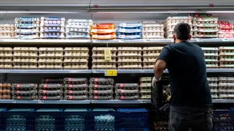 AUSTIN, TEXAS - MAY 11: An employee restocks eggs at an H-E-B grocery store on May 11, 2026 in Austin, Texas. The U.S. Producer Price Index (PPI) suggests that rising fuel prices may be beginning to weigh on wholesale margins, as ongoing tensions in the Strait of Hormuz continue to strain global energy markets.   Brandon Bell/Getty Images/AFP (Photo by Brandon Bell / GETTY IMAGES NORTH AMERICA / Getty Images via AFP)
