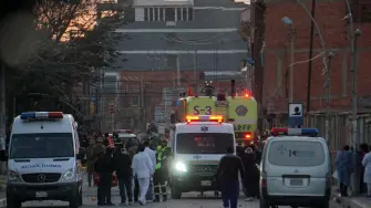 This picture released by APG Noticias shows emergency personnel and firefighters working at the site of an explosion at an army barracks in Viacha, Bolivia, on September 4, 2026. At least 58 people, including 52 civilians and six military personnel, were injured in the blast, which occurred in an area where explosive material was stored, according to Defense Minister Ernesto Justiniano. (Photo by APG NOTICIAS / AFP) / RESTRICTED TO EDITORIAL USE - MANDATORY CREDIT "AFP PHOTO / APG NOTICIAS" - HANDOUT - NO MARKETING NO ADVERTISING CAMPAIGNS - DISTRIBUTED AS A SERVICE TO CLIENTS