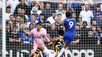 Chelsea's Brazilian striker #09 Joao Pedro (R) wactches his sot in to the net as he scores the team's second goal during the English Premier League football match between Chelsea and Hull City at Stamford Bridge in London on September 12, 2026. (Photo by Henry NICHOLLS / AFP) / RESTRICTED TO EDITORIAL USE. No use with unauthorized audio, video, data, fixture lists, club/league logos or 'live' services. Online in-match use limited to 120 images. An additional 40 images may be used in extra time. No video emulation. Social media in-match use limited to 120 images. An additional 40 images may be used in extra time. No use in betting publications, games or single club/league/player publications. /