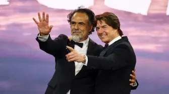 El director Alejandro G. Iñárritu y el actor Tom Cruise.