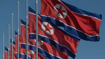North Korean flags fly at half-mast in solidarity with Cuba following the death of Fidel Castro, in Pyongyang on November 28, 2016. (Photo by Ed JONES / AFP)