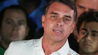 Brazilian presidential candidate Flavio Bolsonaro of the Liberal Party (PL) speaks after losing the presidential runoff election, in Brasilia, Brazil October 25, 2026. REUTERS/Adriano Machado