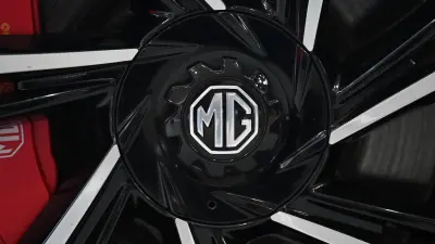 The MG logo is seen on an MG Cyberster at the Beijing Auto Show in Beijing on April 26, 2026. (Photo by GREG BAKER / AFP)