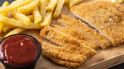 La milanesa cuenta una historia que va más allá de su nombre.