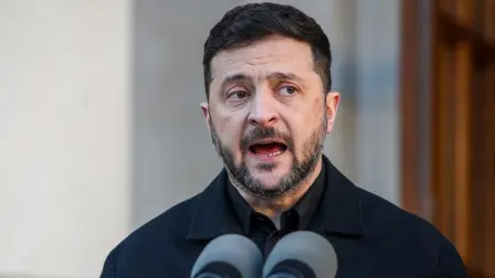 Ukraine's President Volodymyr Zelensky speaks during a joint press conference with Ireland's Prime Minister Micheal Martin (not pictured) following their meeting during his visit to Dublin on December 2, 2025. (Photo by Paul Faith / AFP)