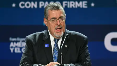 (FILES) Guatemala's President Bernardo Arevalo speaks during the inauguration of the Latin America and the Caribbean International Economic Forum at the Panama Convention Center in Panama City on January 28, 2026. Arevalo accused the prosecutors office with which he is engaged in an open conflict of interfering in the process to select the justices of the countrys highest court on February 13, 2026. (Photo by MARTIN BERNETTI / AFP)
