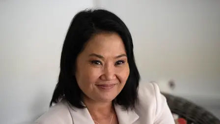 Peru's presidential candidate Keiko Fujimori, for the Fuerza Popular party, gestures during an interview with AFP at the party headquarters in Lima on April 10, 2026. Fujimori, the frontrunner in Peru's presidential race, vowed expel illegal migrants, attract US investment and extend a conservative tide sweeping power in Latin America, in an exclusive interview with AFP on April 10, 2026, on the eve of the April 12 election. (Photo by Ernesto BENAVIDES / AFP)