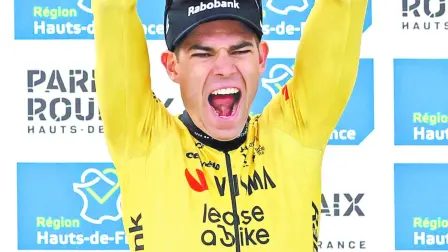 Cycling - Paris-Roubaix - Paris, France - April 12, 2026Team Visma | Lease a Bike's Wout van Aert celebrates on the podium after winning the 2026 Paris-Roubaix REUTERS/Christian Hartmann     TPX IMAGES OF THE DAY