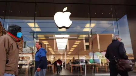 CHICAGO, ILLINOIS - NOVEMBER 28: The Apple company logo hangs above an Apple retail store on November 28, 2022 in Chicago, Illinois. Apple is currently facing shortages in iPhone supplies due to COVID-19 restrictions in China and unrest at one of Apple's major Chinese suppliers.   Scott Olson/Getty Images/AFP (Photo by SCOTT OLSON / GETTY IMAGES NORTH AMERICA / Getty Images via AFP)