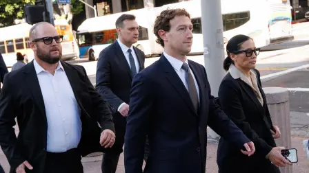 Meta CEO and Chairman Mark Zuckerberg arrives at Los Angeles Superior Court ahead of the social media trial tasked to determine whether social media giants deliberately designed their platforms to be addictive to children, in Los Angeles, on February 18, 2026. Zuckerberg is scheduled to testify Wednesday. (Photo by Patrick T. Fallon / AFP)