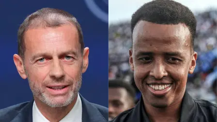 El presidente de la UEFA, Aleksander Ceferin y el árbitro internacional somalí, Omar Abdulkadir Artan.