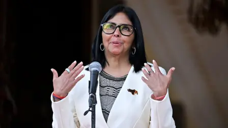 Venezuela's interim President Delcy Rodriguez gives a press conference after the signing of an oil agreement with the United States at the Miraflores Presidential Palace in Caracas on September 2, 2026. US Energy Secretary Chris Wright oversaw the signing of deals worth "tens of billions of dollars" between Venezuela and oil majors Chevron and ENI as well as with energy company GE Vernova on September 2, 2026. (Photo by Juan BARRETO / AFP)