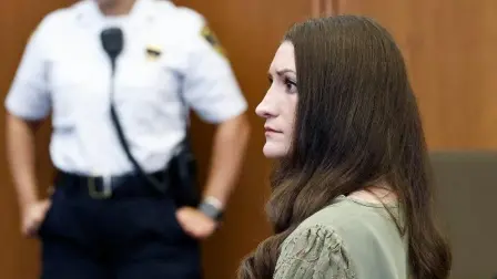 Lindsay Clancy looks on as jurors (out of frame) enter the courtroom during Clancy's murder trial at the Plymouth County Superior Court in Plymouth, Massachusetts, on September 4, 2026. Lindsay Clancy is on trial for the January 2023 strangulation deaths of her three young children. Her five-week trial, which was televised and featured more than 80 witnesses, has sparked debate in the United States over maternal mental health. (Photo by Greg Derr / POOL / AFP)