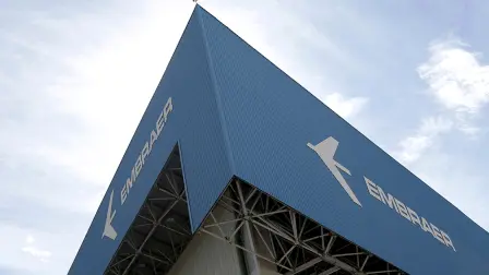 FILE PHOTO: The logo of Brazilian jets maker Embraer is seen on a factory in Sao Jose dos Campos - FILE PHOTO: The logo of Brazilian jets maker Embraer is seen on a factory in Sao Jose dos Campos, Brazil, December 23, 2017. REUTERS/Leonardo Benassatto/File photo - NARCH/NARCH30