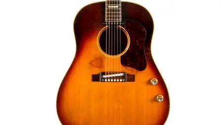 A guitar owned by former Beatle John Lennon is pictured  in this handout photo - A 1962 J-160E Gibson acoustic guitar stolen from former Beatle John Lennon in the 1960s is pictured  in this undated handout photo obtained by Reuters November 7, 2015. The guitar sold at auction November 7, 2015 for $2.41 million. REUTERS/Julien