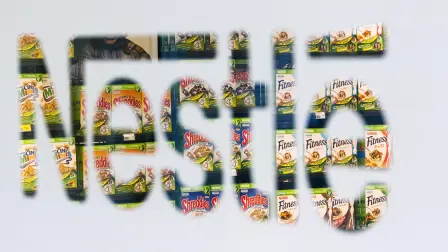 File picture shows Nestle cereal boxes through a logo in the company supermarket at the Nestle headquarters in Vevey - Nestle cereal boxes are pictured through a logo in the company supermarket at the Nestle headquarters in Vevey, in this file picture taken February 17, 2011. Nestle, the world