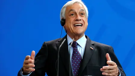 Chilean President Sebastian Pinera talks during a news conference with German Chancellor Angela Merkel in Berlin