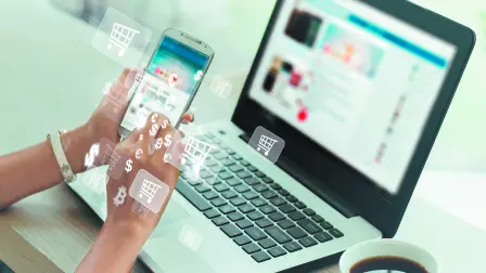 Businesswoman,Phone,And,Laptop,Using,,,Online,Shopping,Concept.