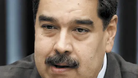 Venezuela's President Nicolas Maduro talks to the media during a news conference at Miraflores Palace in Caracas, Venezuela September 18, 2018. REUTERS/Marco Bello