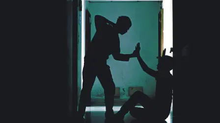 Silhouette,Young,Man,Being,Mugged,In,A,Dark,Alley,At