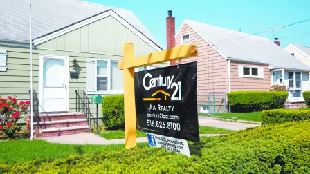A 'for sale' is seen outside a single family house in Uniondale, New York, U.S., May 23, 2016.  REUTERS/Shannon Stapleton