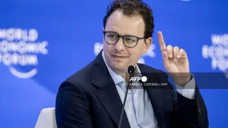 Anthropic CEO Dario Amodei gestures as he addresses the audience as part of a session on AI during the World Economic Forum (WEF) annual meeting in Davos on January 23, 2025. (Photo by FABRICE COFFRINI / AFP)