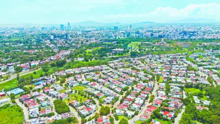 Aerial View of Housing Zone in Guadalajara, Jalisco. Mexico. Skyscrapers in the Background