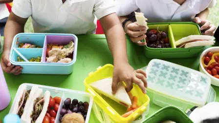 Kids eating lunch at elementary school
