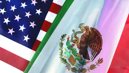 Flags of Mexico and the U.S. shown at a civic event