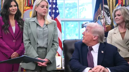 US Secretary of Homeland Security Kristi Noem (L), US Attorney General Pam Bondi (2L) and US Senator Marsha Blackburn (R-TN) (R) listen as US President Donald Trump speaks before signing an order sending National Guard troops to Memphis, in the Oval Office of the White House in Washington, DC, on September 15, 2025. US President Donald Trump said on September 15 he was signing an order sending a federal "task force" including National Guard troops to the city of Memphis, in the latest stage of his crime crackdown that critics have branded authoritarian."The effort will include the National Guard as well as the FBI" and other federal agencies, Trump told reporters at a signing ceremony in the Oval Office, adding that it was "very important because of the crime that's going on." (Photo by SAUL LOEB / AFP)