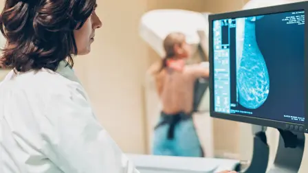 Doctor and patient making a mammography