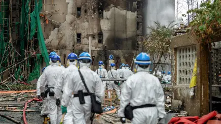 Agentes de la Unidad de Identificación de Víctimas de Desastres (DVIU) trabajando en la zona afectada.