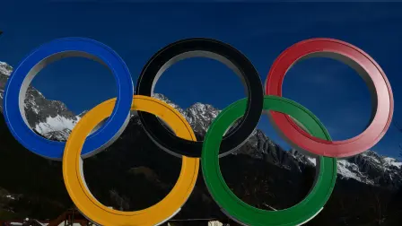 A picture shows the Olympic rings in Anterselva which will host the biathlon competition ahead of Milano Cortina 2026 Games, on December 12, 2025. (Photo by Stefano RELLANDINI / AFP)