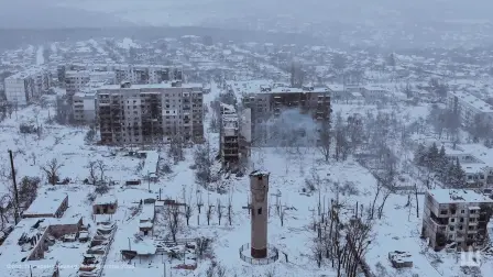 This handout photograph, taken on December 29, 2025, and released by the press service of the 116th Separate Mechanized Brigade of the Ukrainian Ground Forces on December 30, shows an aerial view of heavily damaged residential buildings in the frontline town of Kupiansk, Kharkiv region, amid the Russian invasion of Ukraine. (Photo by Handout / 116th Separate Mechanized Brigade of the Ukrainian Ground Forces / AFP) / XGTY / RESTRICTED TO EDITORIAL USE - MANDATORY CREDIT "AFP PHOTO / 116TH SEPARATE MECHANIZED BRIGADE OF THE UKRAINIAN GROUND FORCES" - NO MARKETING NO ADVERTISING CAMPAIGNS - DISTRIBUTED AS A SERVICE TO CLIENTS
