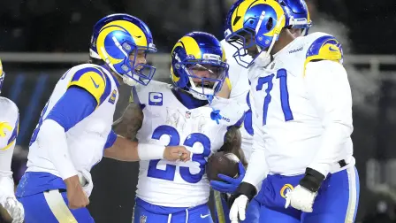 CHICAGO, ILLINOIS - JANUARY 18: Kyren Williams #23 of the Los Angeles Rams celebrates with teammates after his rushing touchdown against the Chicago Bears during the fourth quarter in the NFC Divisional Playoffs at Soldier Field on January 18, 2026 in Chicago, Illinois.   Patrick McDermott/Getty Images/AFP (Photo by Patrick McDermott / GETTY IMAGES NORTH AMERICA / Getty Images via AFP)