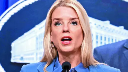 FILE PHOTO: U.S. Attorney General Pam Bondi speaks at a press conference following the arrest in the D.C. pipe bomber investigation, at the Justice Department in Washington, D.C., U.S., December 4, 2025. REUTERS/Jessica Koscielniak/File Photo
