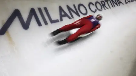 Latvia's Kristers Aparjods takes part in the luge men's singles training session at Cortina Sliding Centre during the Milano Cortina 2026 Winter Olympic Games in Cortina d'Ampezzo on February 4, 2026. (Photo by FRANCK FIFE / AFP)