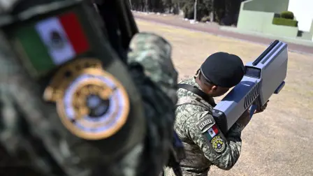 Members of the Mexican Army's special anti-drone battalion, tasked with protecting venues and ensuring security for the 2026 World Cup, give a demonstration for the press at Military Camp Number 1 in the municipality of Naucalpan, State of Mexico, on February 17, 2026. (Photo by Alfredo ESTRELLA / AFP)