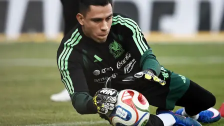 Mexico's goalkeeper Luis Angel Malagon catches the ball during a training session at La Corregidora stadium in Santiago de Queretaro, Queretaro State, Mexico, on February 24, 2026. Mexico will play Iceland in a friendly football match on February 25 in Queretaro amid security concerns following countrywide incidents after the death of CNJG cartel leader 