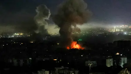 Smoke rises from the site of an Israeli airstrike that targeted an area in Beiruts southern suburbs on March 11, 2026. Lebanon was drawn into the Middle East war last week when Hezbollah attacked Israel in response to the killing of the Iranian supreme leader in US-Israeli strikes. Israel, which kept up strikes targeting Hezbollah despite a 2024 ceasefire, has since launched attacks across Lebanon and sent ground troops into border areas. (Photo by AFP) /