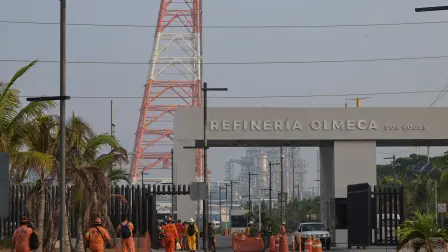 Workers at the Olmeca oil refinery of the company Petroleos de Mexico (PEMEX) head to work inside the refinery on May 21, 2024 in Paraiso, Tabasco state, Mexico. While the north of Mexico is home to industrial hubs closely linked to the neighboring United States, the world's largest economy, the south has historically lagged behind economically, prompting Mexico's outgoing President Andres Manuel Lopez Obrador to pursue economic development projects for the region. (Photo by Yuri CORTEZ / AFP)