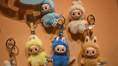 Newly-launched mini Labubu toys are displayed at a Pop Mart shop in Beijing on August 29, 2025. (Photo by Jade Gao / AFP)