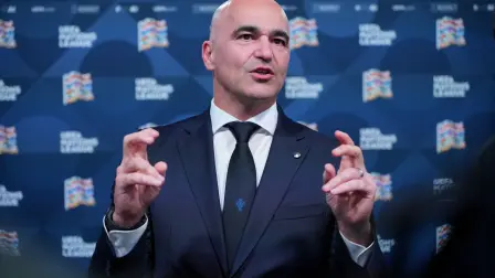 Portugal's national football team head coach Roberto Martinez talks to the press after attending the 2026/27 UEFA Nations League league phase draw ceremony as part of the European football governing body's 50th annual Ordinary Congress in Brussels on February 12, 2026. (Photo by Pau BARRENA / AFP)
