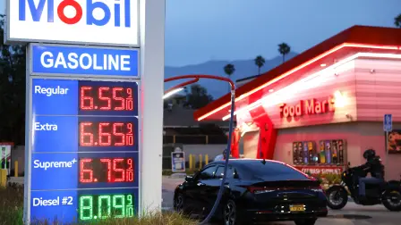 PASADENA, CALIFORNIA - MARCH 30: Gas prices are displayed at a Mobil gas station on March 30, 2026 in Pasadena, California. The average price of one gallon of regular self-service gasoline rose to $5.99 today in Los Angeles County, climbing from $4.69 one month ago, amid the ongoing war with Iran.   Mario Tama/Getty Images/AFP (Photo by MARIO TAMA / GETTY IMAGES NORTH AMERICA / Getty Images via AFP)