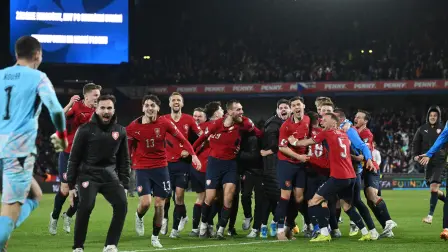 Czech Republic's team players celebrate after winning at the penalty shoot-outs the FIFA World Cup 2026 European qualification final football match Czech Republic vs Denmark on March 31, 2026 in Prague, Czech Republic. (Photo by Michal Cizek / AFP)