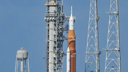 NASA's Artemis II Space Launch System rocket and Orion spacecraft rest on Launch Pad 39B at Kennedy Space Center in Cape Canaveral, Florida, on April 1, 2026, ahead of the crewed lunar mission. Three men and one woman are set to embark on the first crewed journey to the Moon since 1972, a landmark odyssey that aims to launch the US into a new era of space exploration. The NASA mission dubbed Artemis 2 has been years in the making after facing repeated setbacks, but is finally scheduled to take off from Florida as early as April 1 at 6:24 pm (2224 GMT). (Photo by Jim WATSON / AFP)